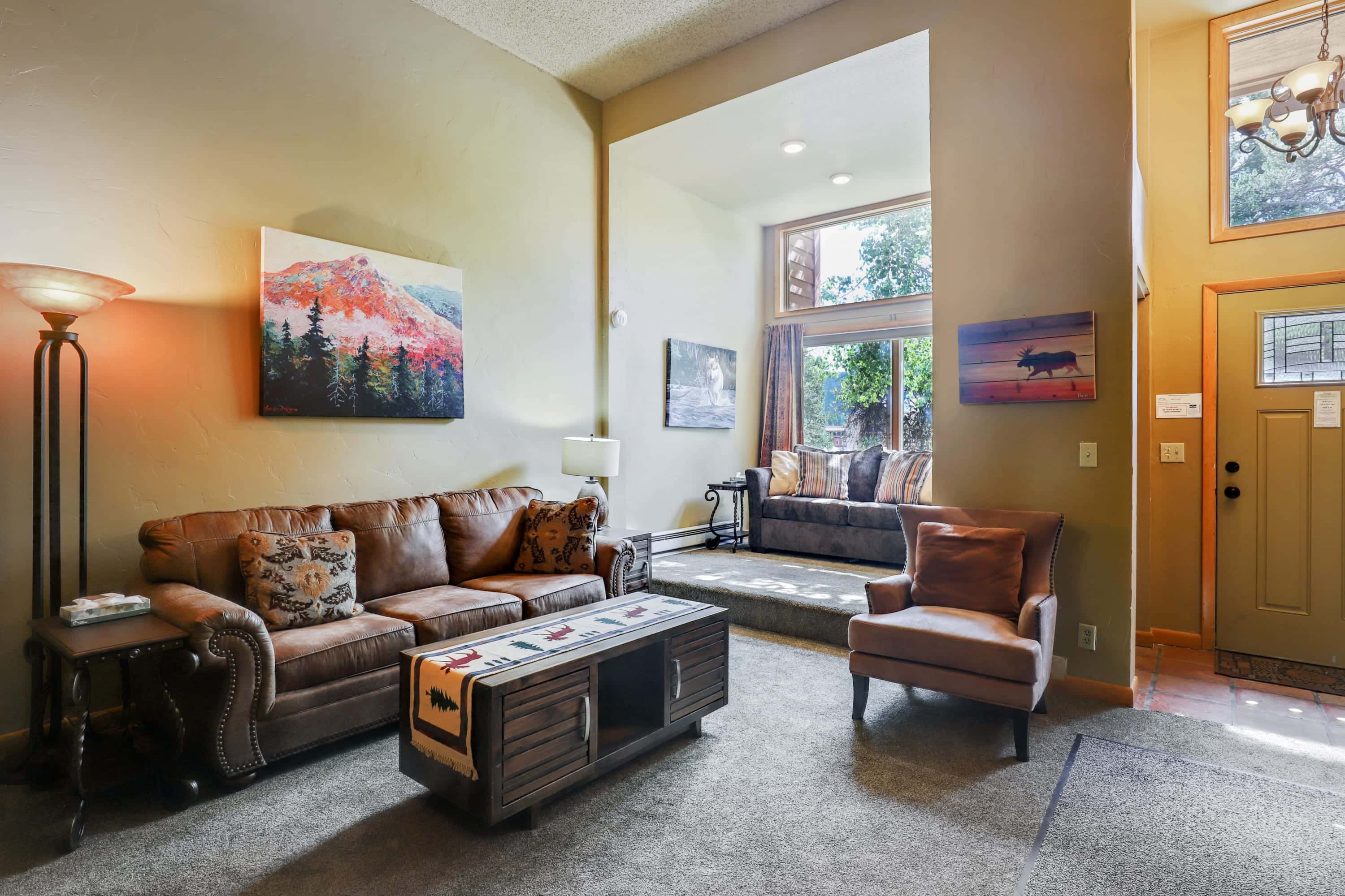 Living room with gas fireplace and flat screen TV