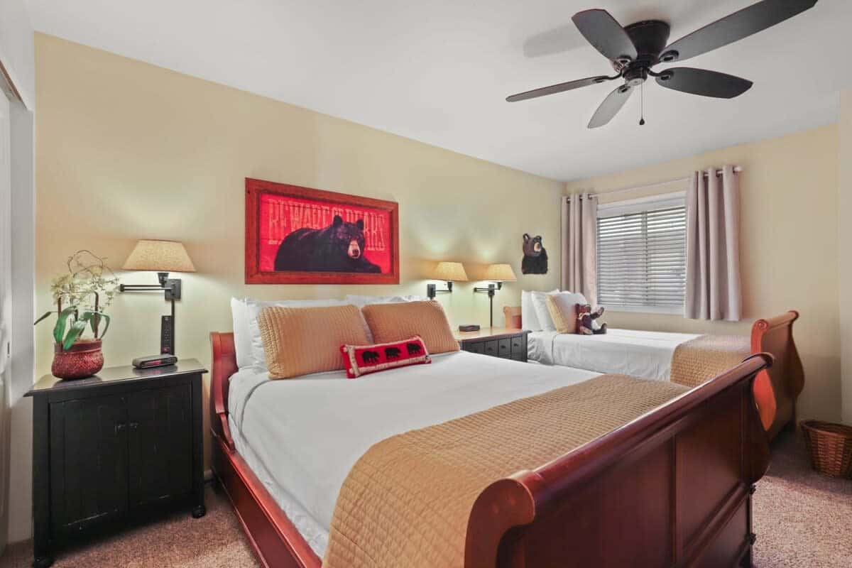 The spacious and cozy second bedroom where you will find a queen bed and a twin bed in sleigh style bed frames providing extra sleeping space for your comfort.