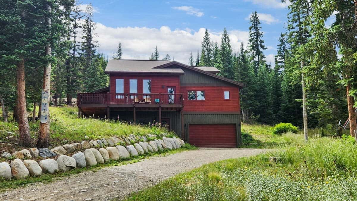 Exterior: On-site parking for 4 cars (2 in garage, 2 in dirt driveway)