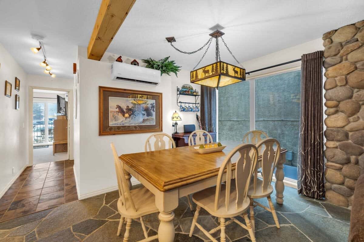 A lovely dining area with seating for up to 6 is adjacent to the kitchen.