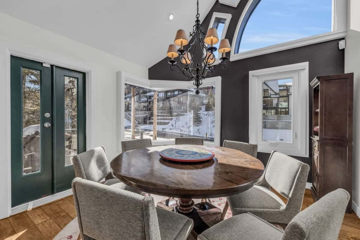 Gather for meals with your group in the bright dining room where you will find a 7-person dining table and large windows filling the space with natural light.