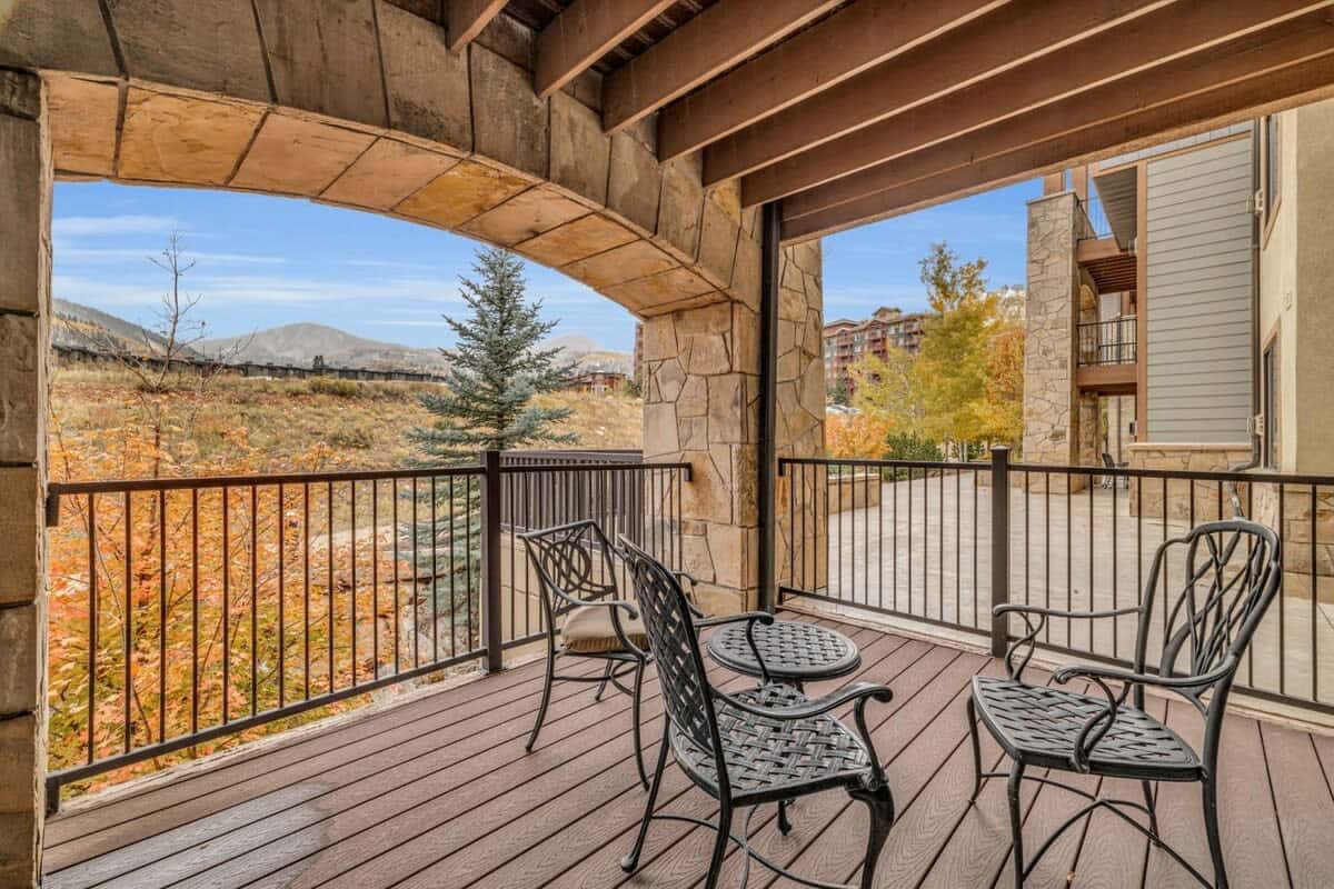 Enjoy the fresh mountain air and surrounding views from the condo’s private balcony.