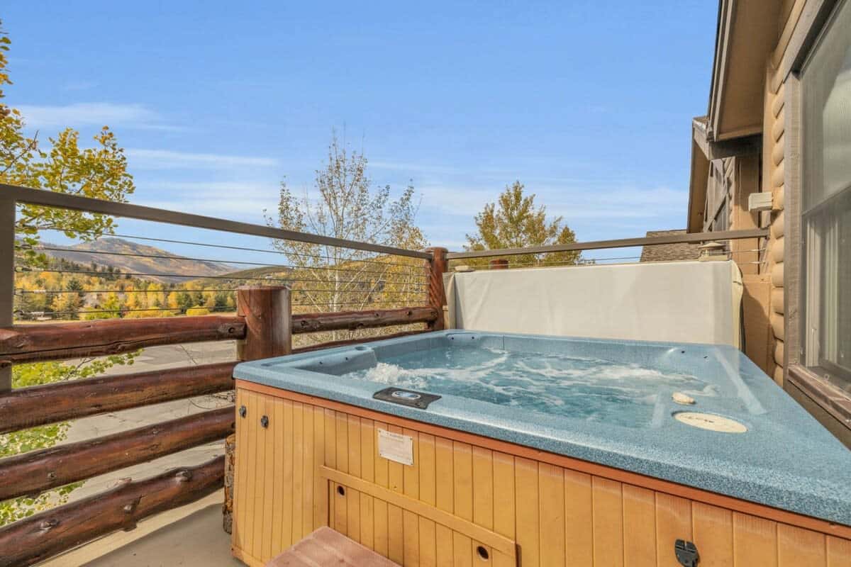 Ease sore muscles while taking in the sunset over the slopes from the condo’s private hot tub.