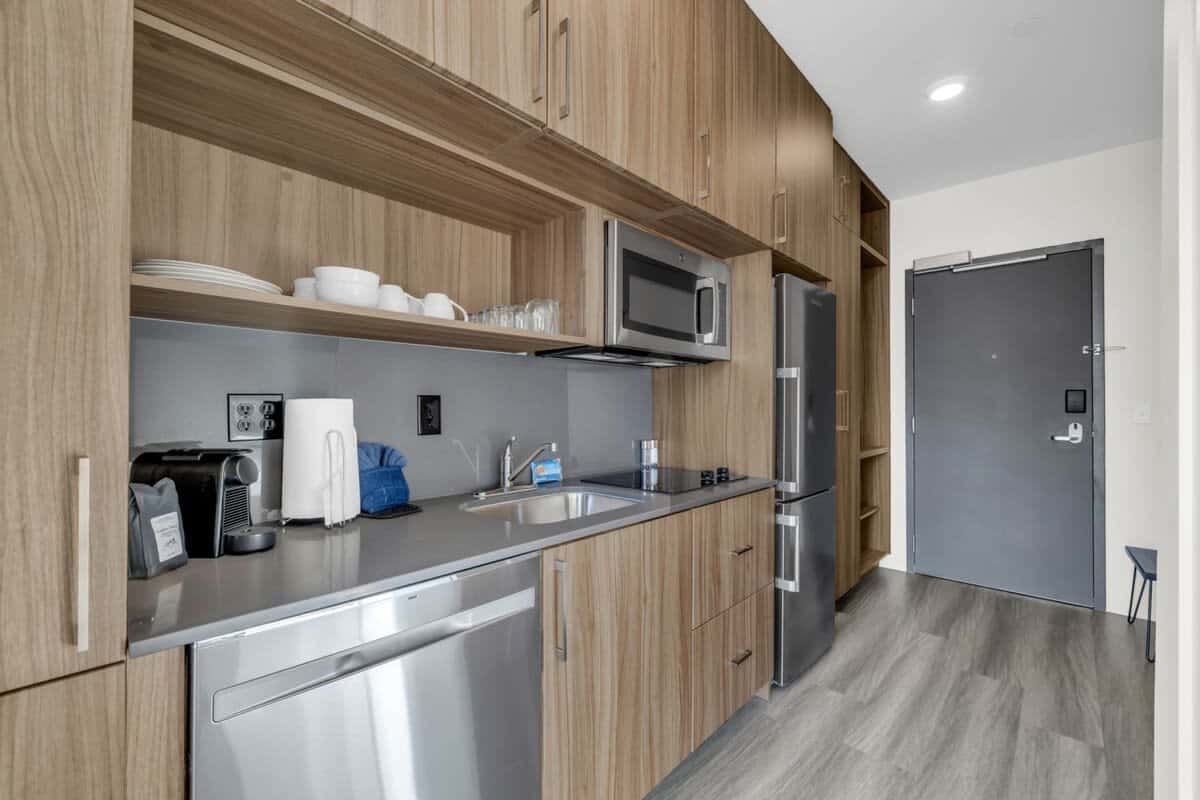 The fully stocked kitchen has stainless steel appliances, Nespresso, a toaster oven, and basic cookware so you can easily prepare delicious meals.