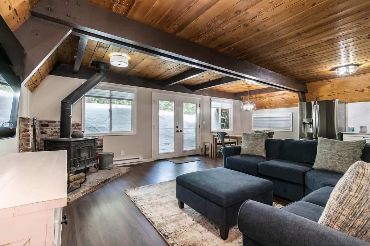 The open living room/kitchen/dining area is a great space for socializing with your group.