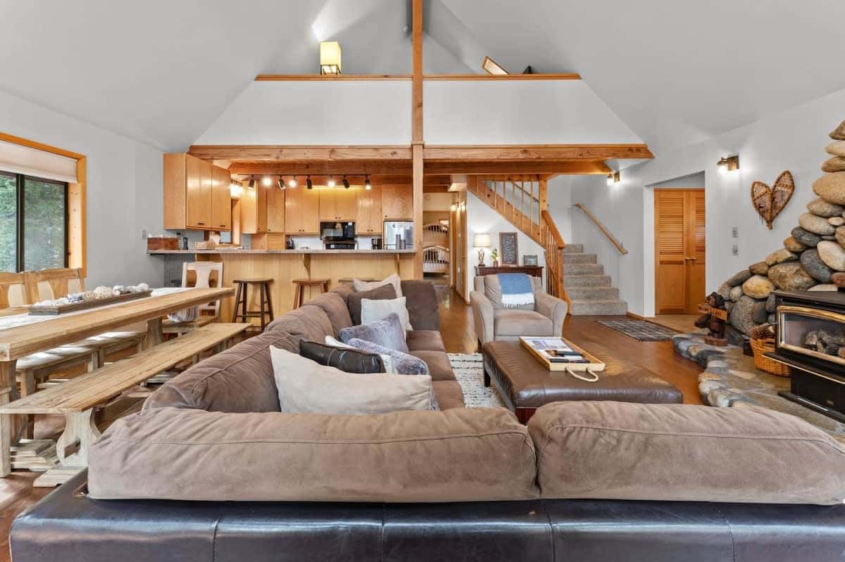 The bright and inviting main level boasts a living room/dining/kitchen that seamlessly blends together in an open layout.