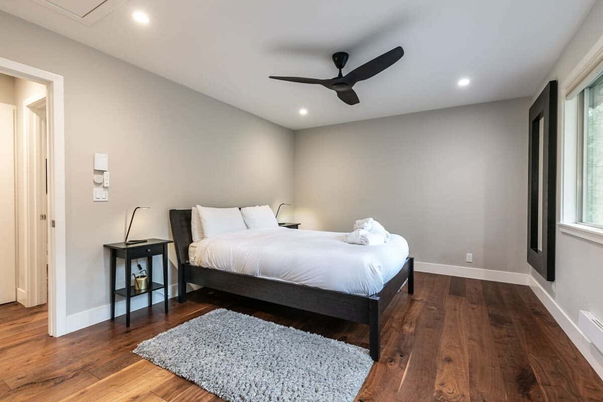 Both of the bedrooms have added amenities ensuring a comfortable stay including electronic blinds, a Smart Fan, and wireless speakers.