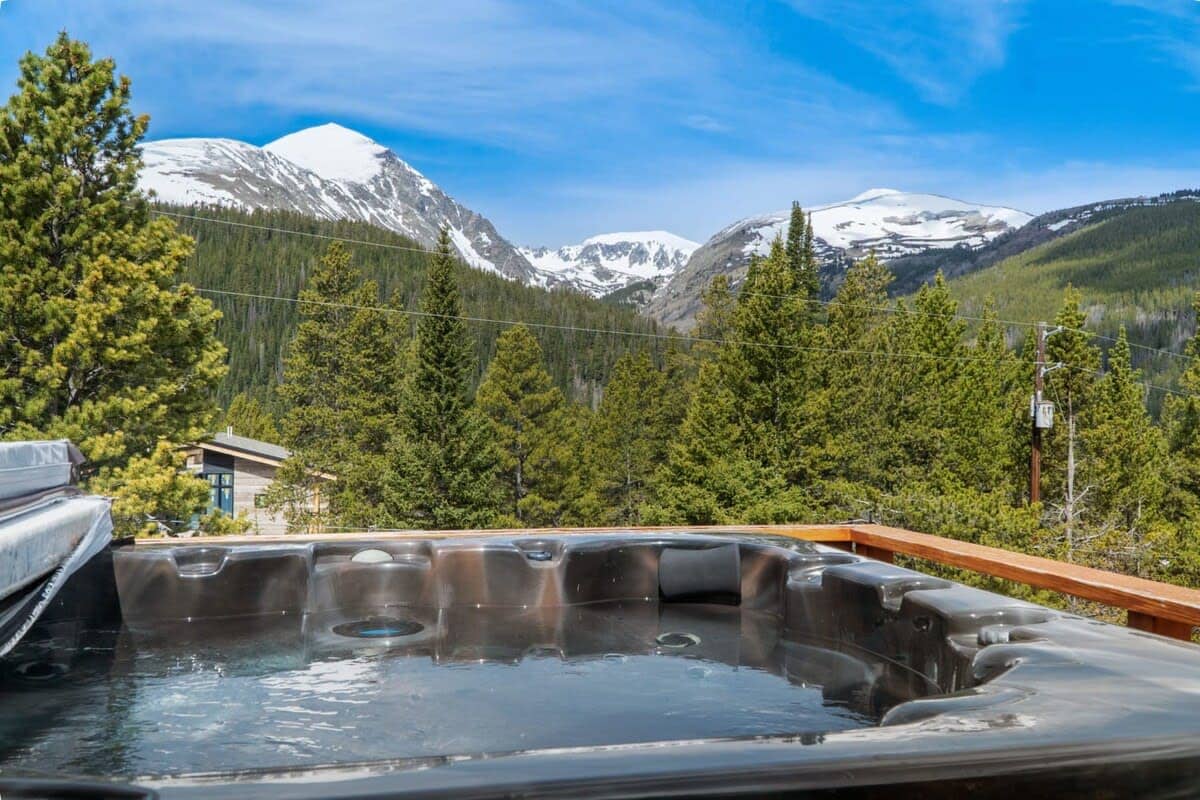Make unforgettable memories from this charming mountain home that boasts a private hot tub with incredible views your whole group will love!