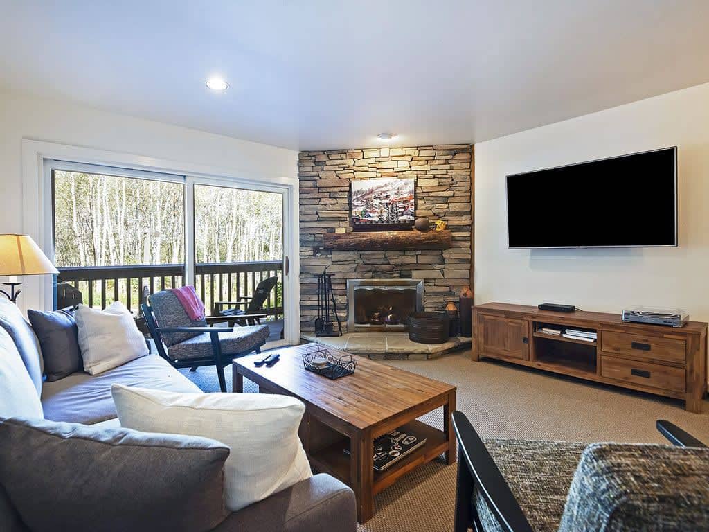 Welcome to this stunning ski-in/out condo with spectacular aspen tree views