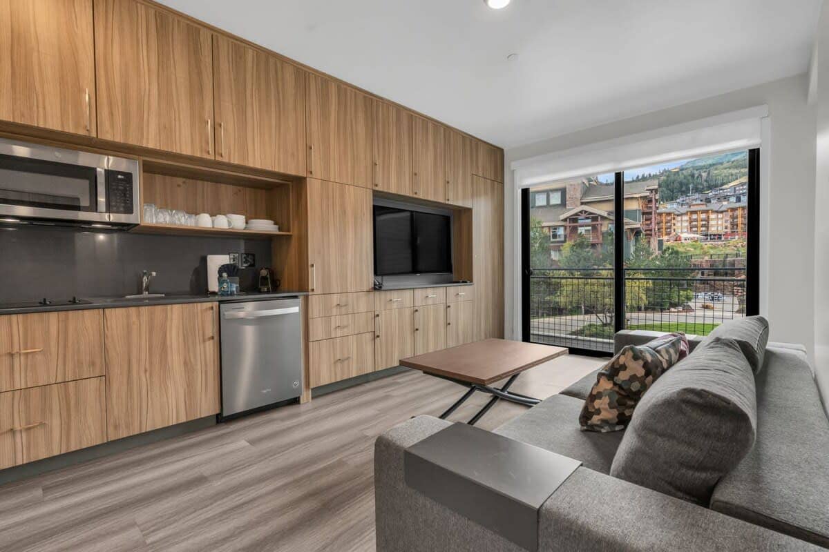 The open shared living space is a dynamic area that can be used as the kitchen, dining area, living room, bedroom, and even workspace.