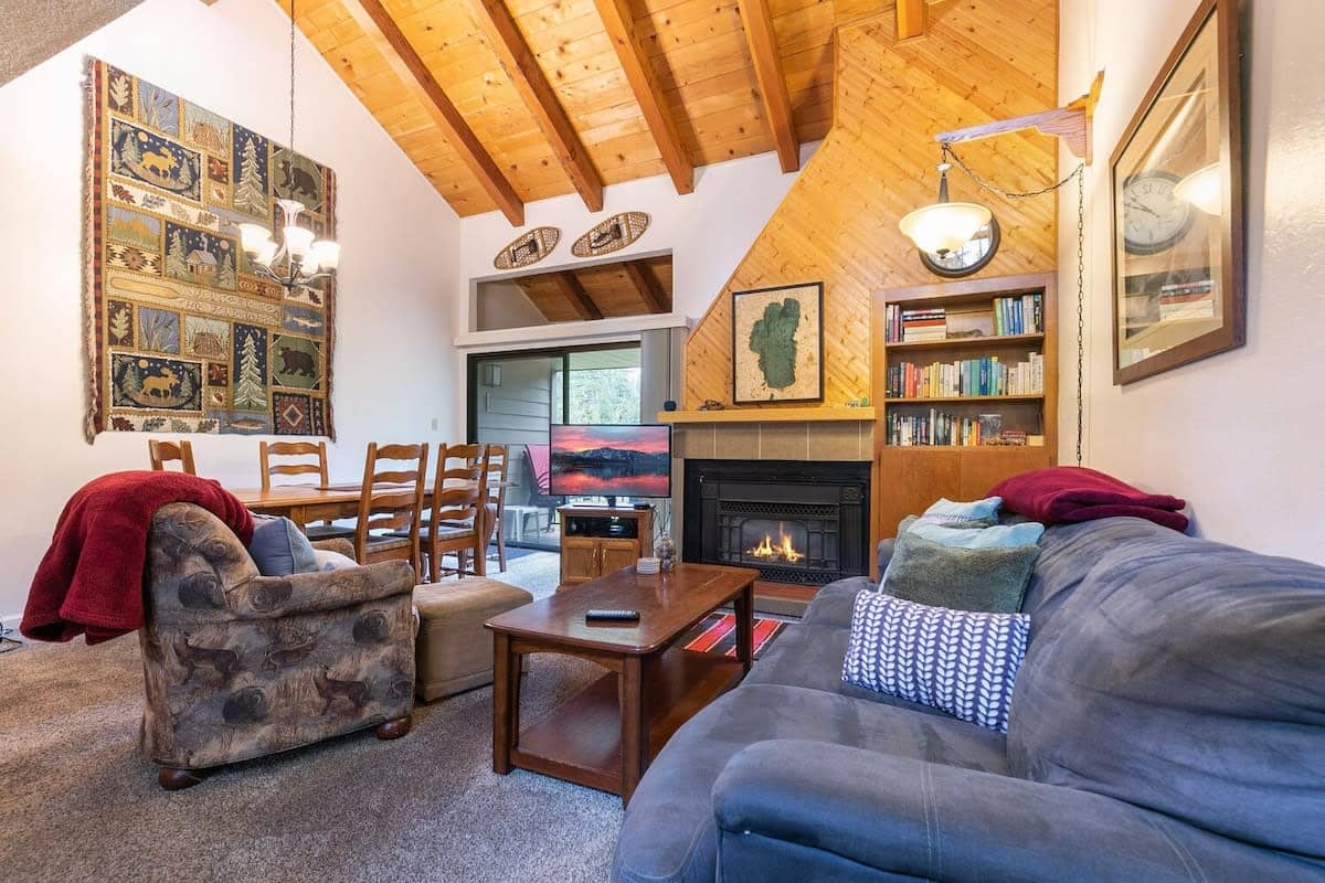 The main level of this townhome features a warm and inviting open floor plan with the kitchen/dining room/living room making it easy to stay connected with your group.