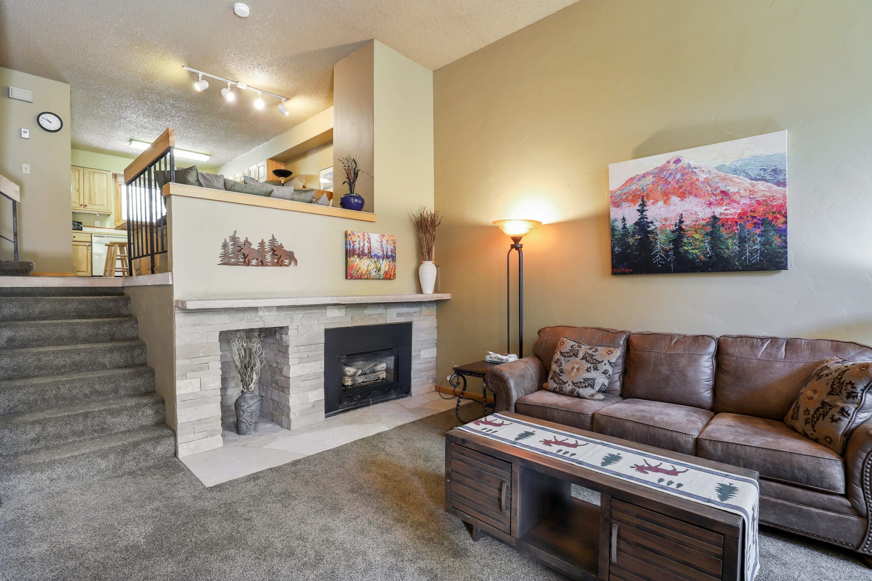 Living room with gas fireplace and flat screen TV