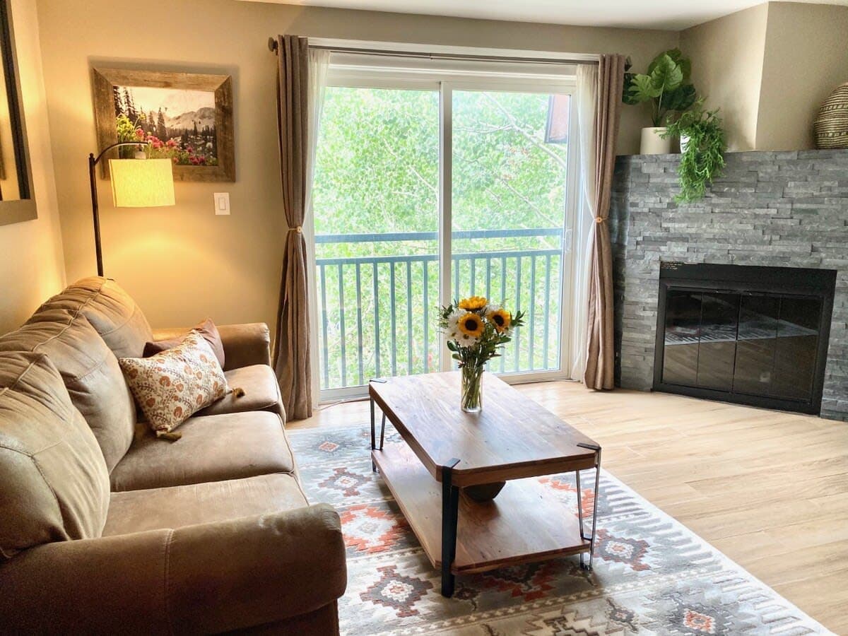 Family room with flat screen TV & balcony