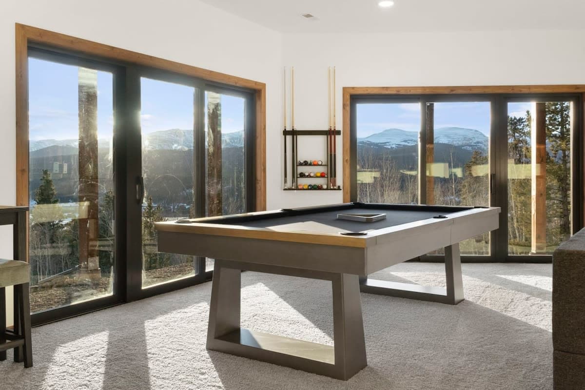 Play some rounds of pool while taking in the mountain views.