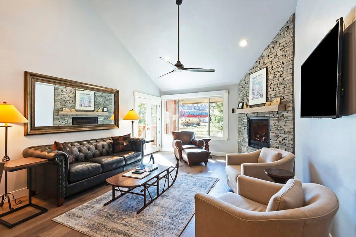 The view from the fabulous living room shows how close this inviting space is to world-class skiing with the First Time chair lift visible through the window. You can ski off the slopes and straight into this cozy space.