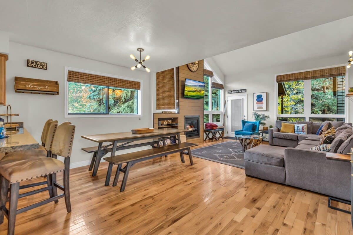 This 4-bedroom townhome is outfitted with chic decor and an open layout surrounded by tree views offering a serene retreat for your stay in Park City.