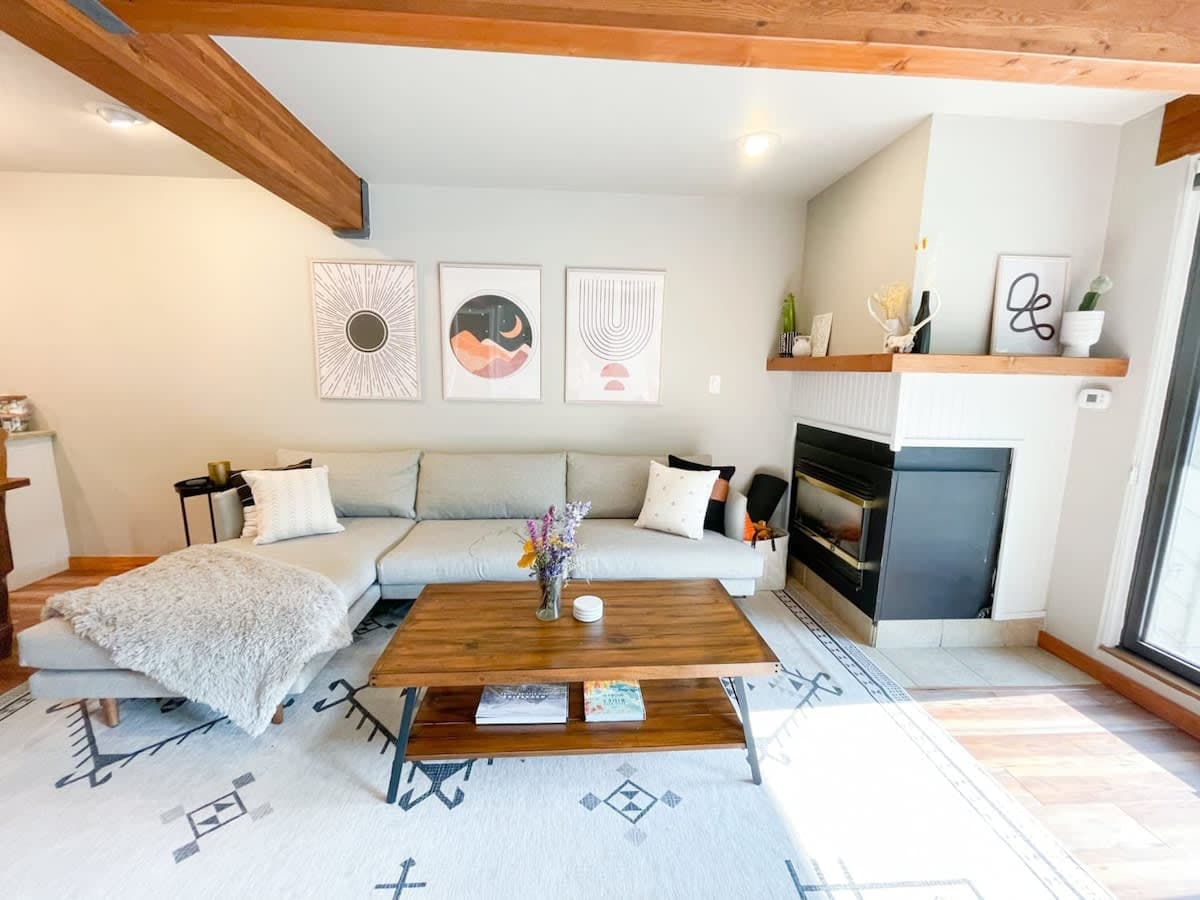 Cozy up in this modern living room near the fireplace
